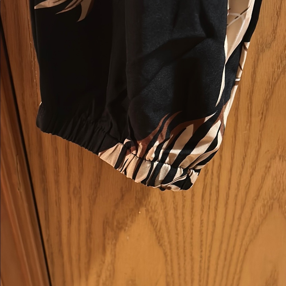 Black and Tan Tropical Print Track Pants - Picture 4 of 4